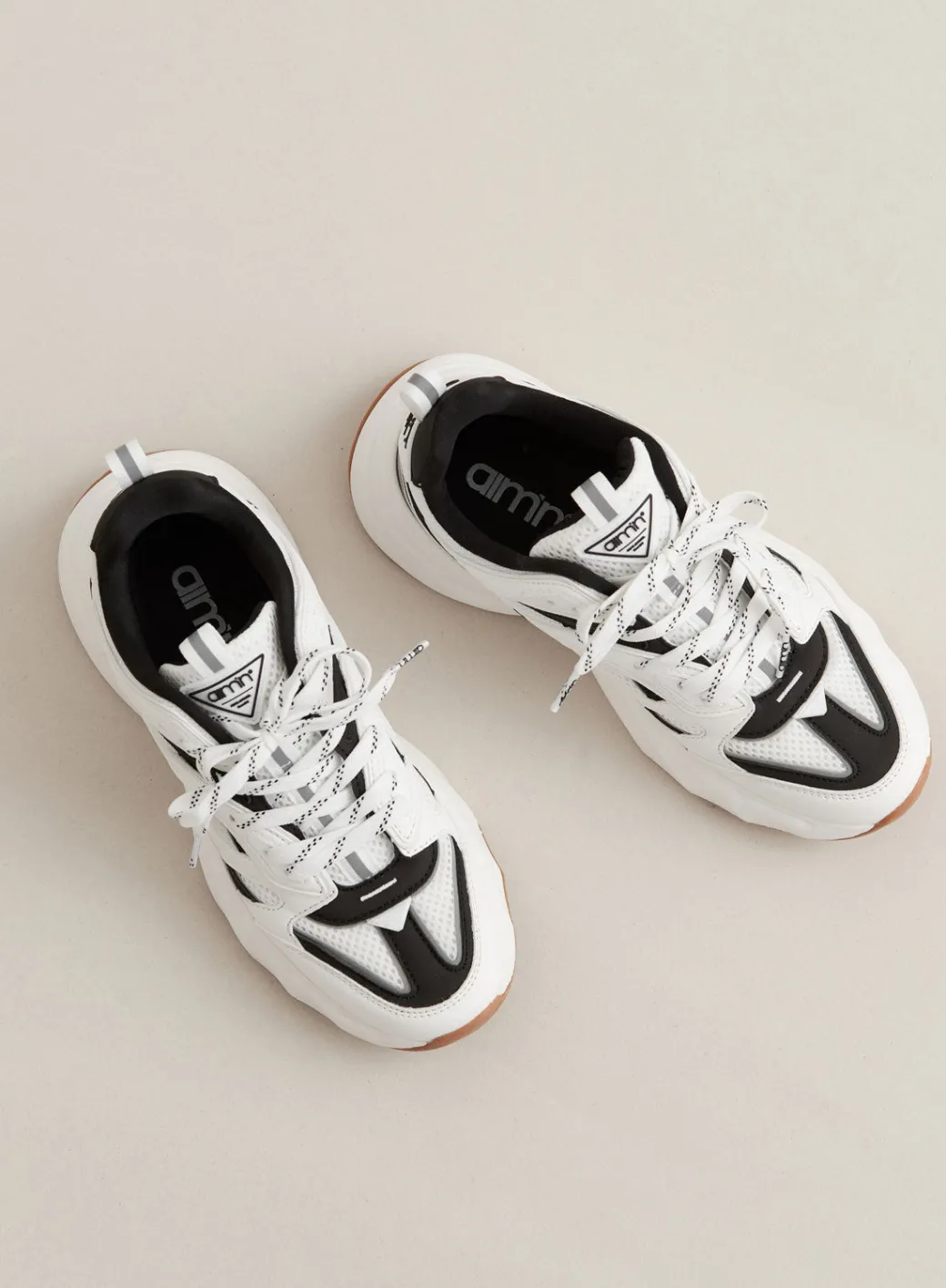 Black/white Athena 100>AIM’N Clearance