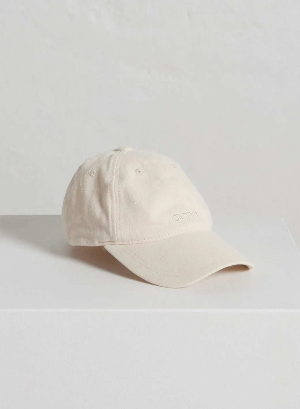 Café Au Lait Small Logo Cap>AIM’N Best