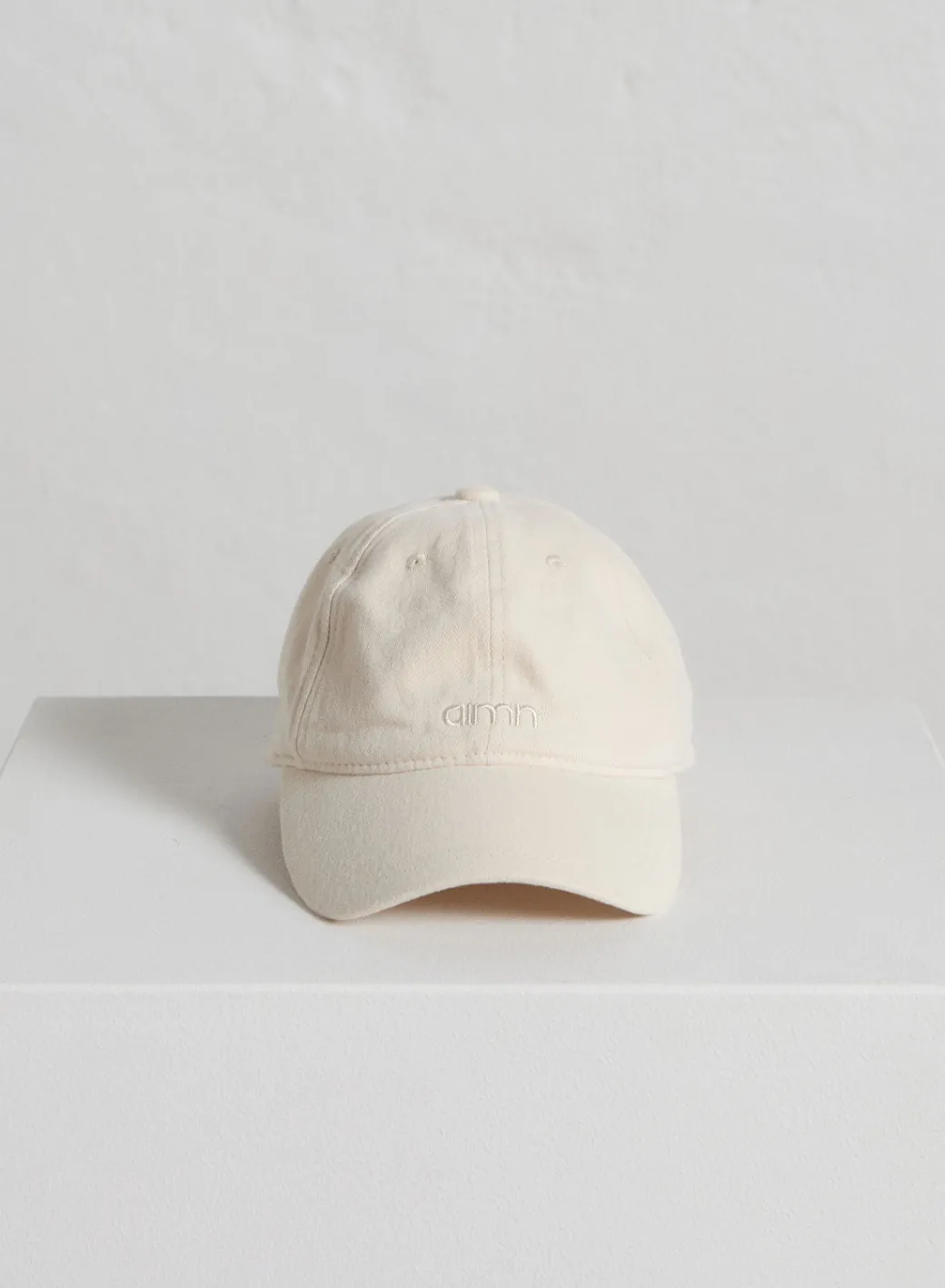 Café Au Lait Small Logo Cap>AIM’N Best