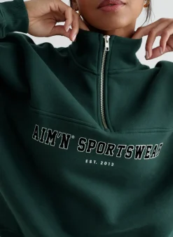 Varsity Sweat Half Zip>AIM’N Hot